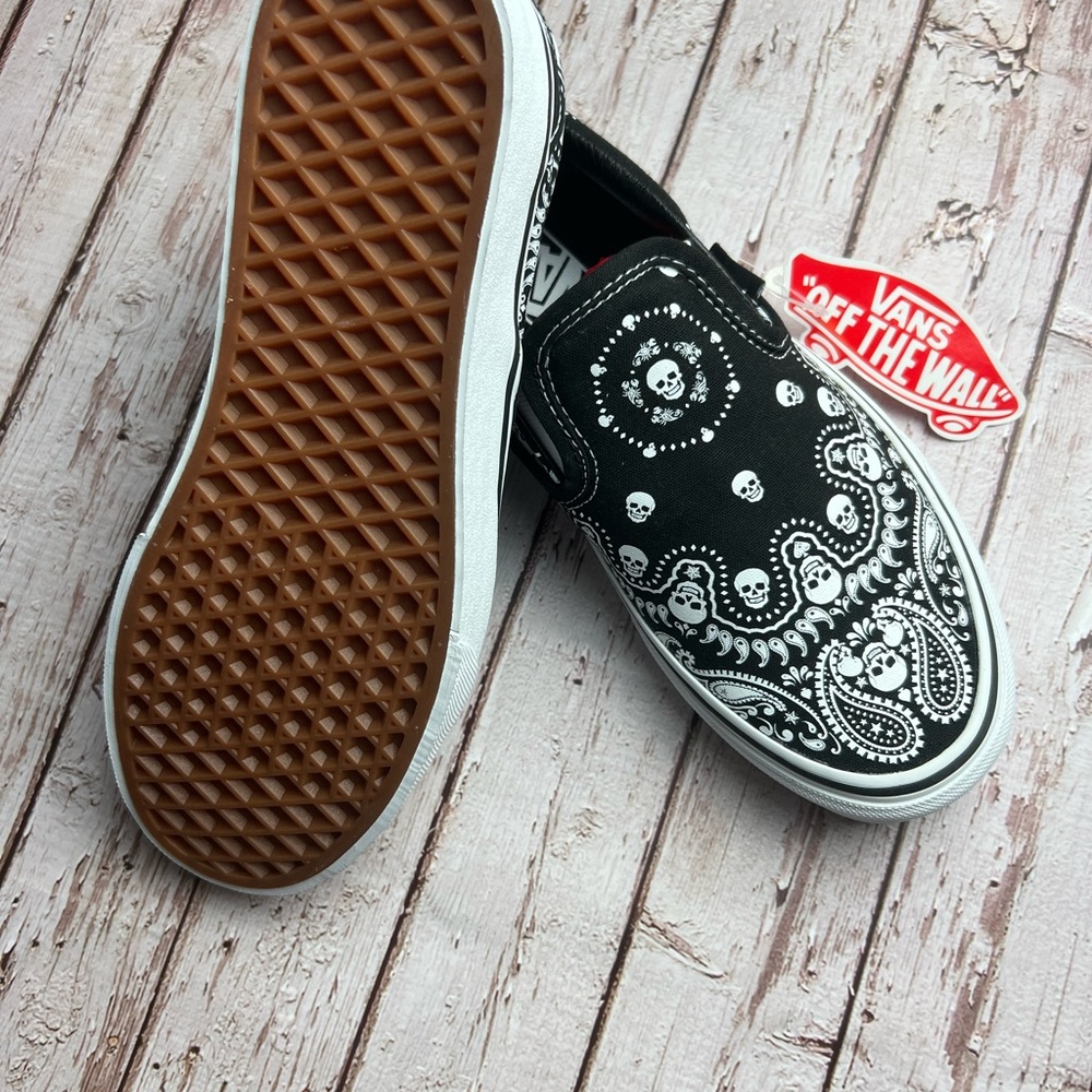 Vans Black and White Slip-On Sneakers